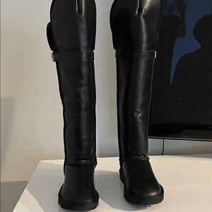 Women’s Ausland Black knee high flux fur lined boots with buckles. Size 6.5